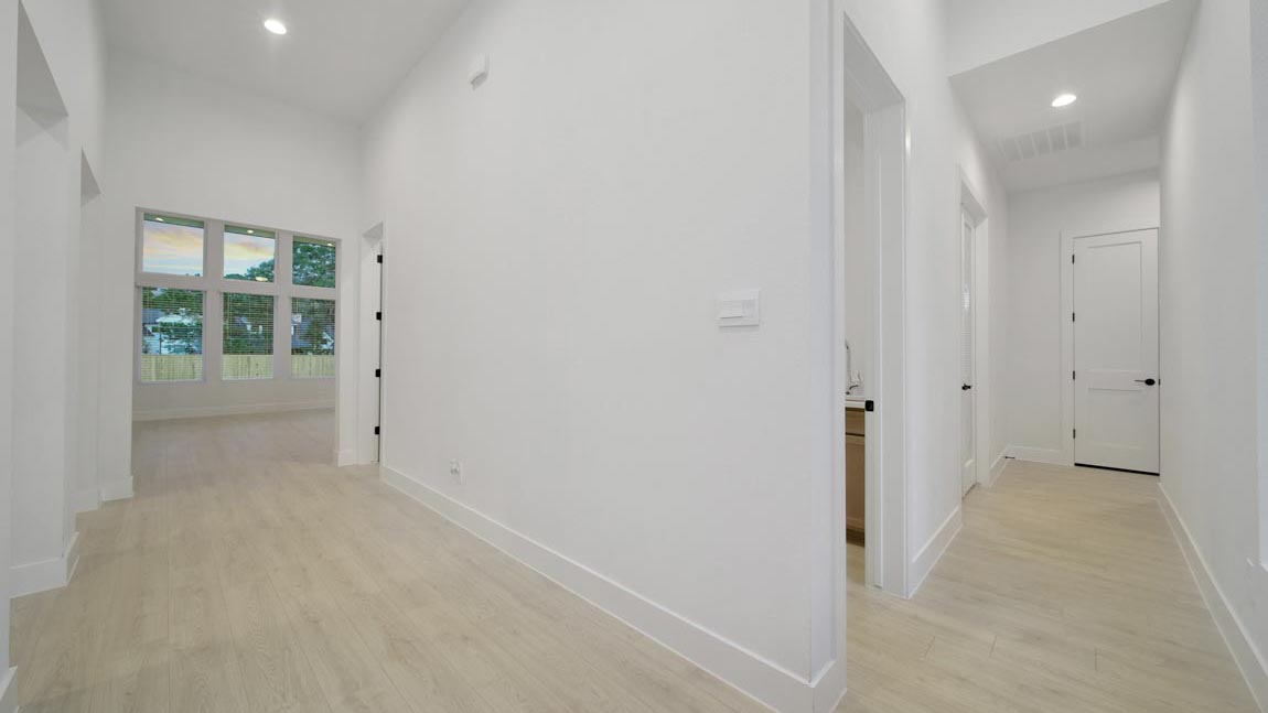 Entry hallway with vinyl flooring sherman williams painted walls