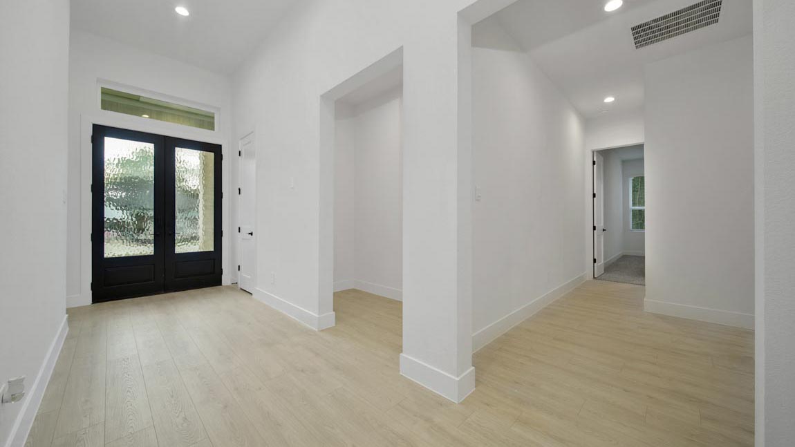 Entry hallway with vinyl flooring