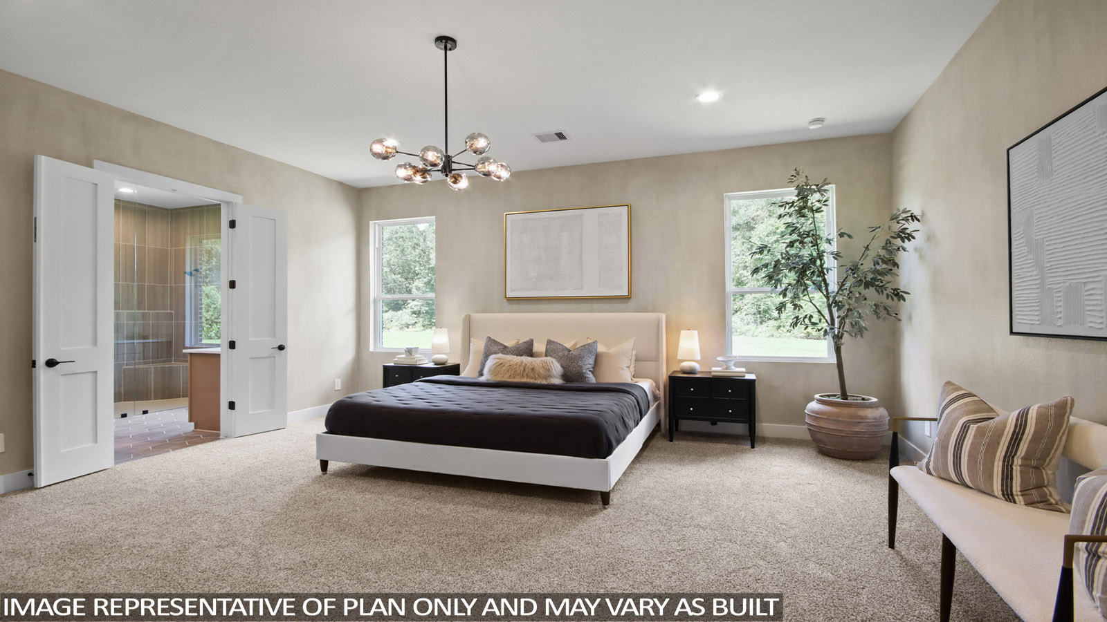 Primary bedroom with carpet flooring