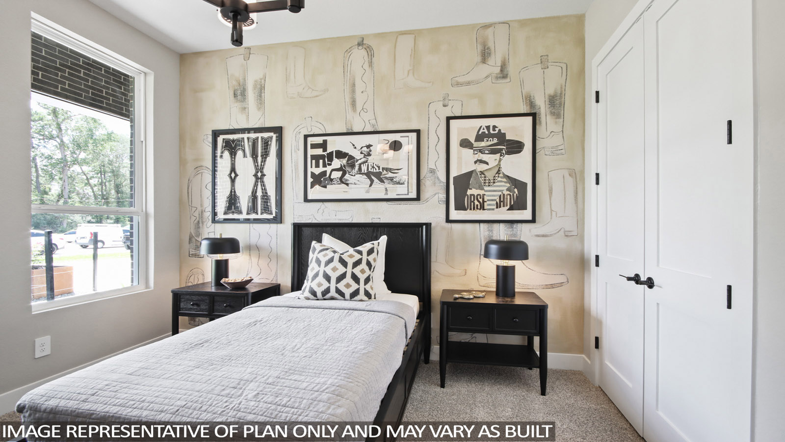 Secondary bedroom with carpet flooring