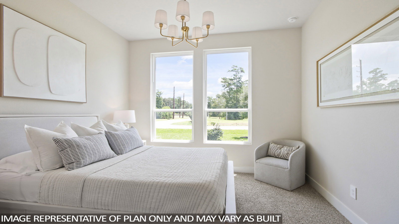 Secondary bedroom with carpet flooring