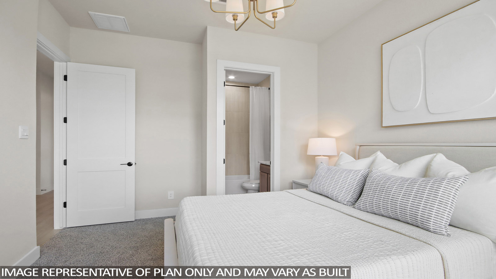 Secondary bedroom with carpet flooring