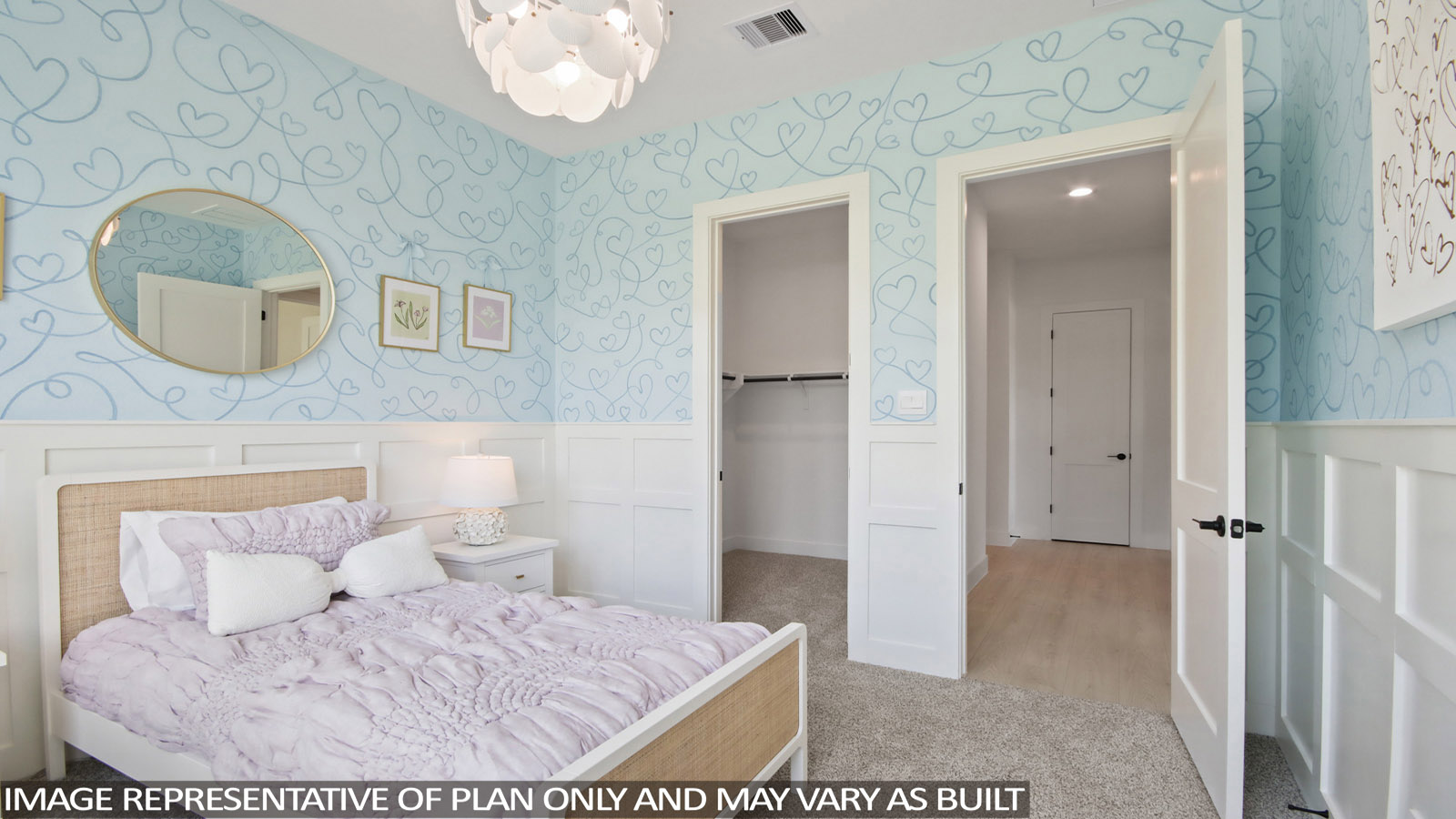 Secondary bedroom with carpet flooring