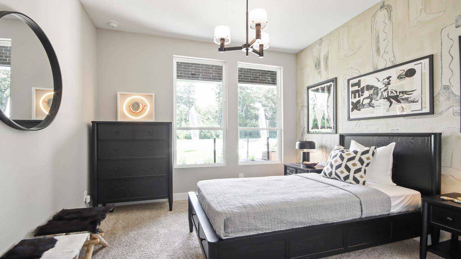 Secondary bedroom with shag carpet flooring and bright window