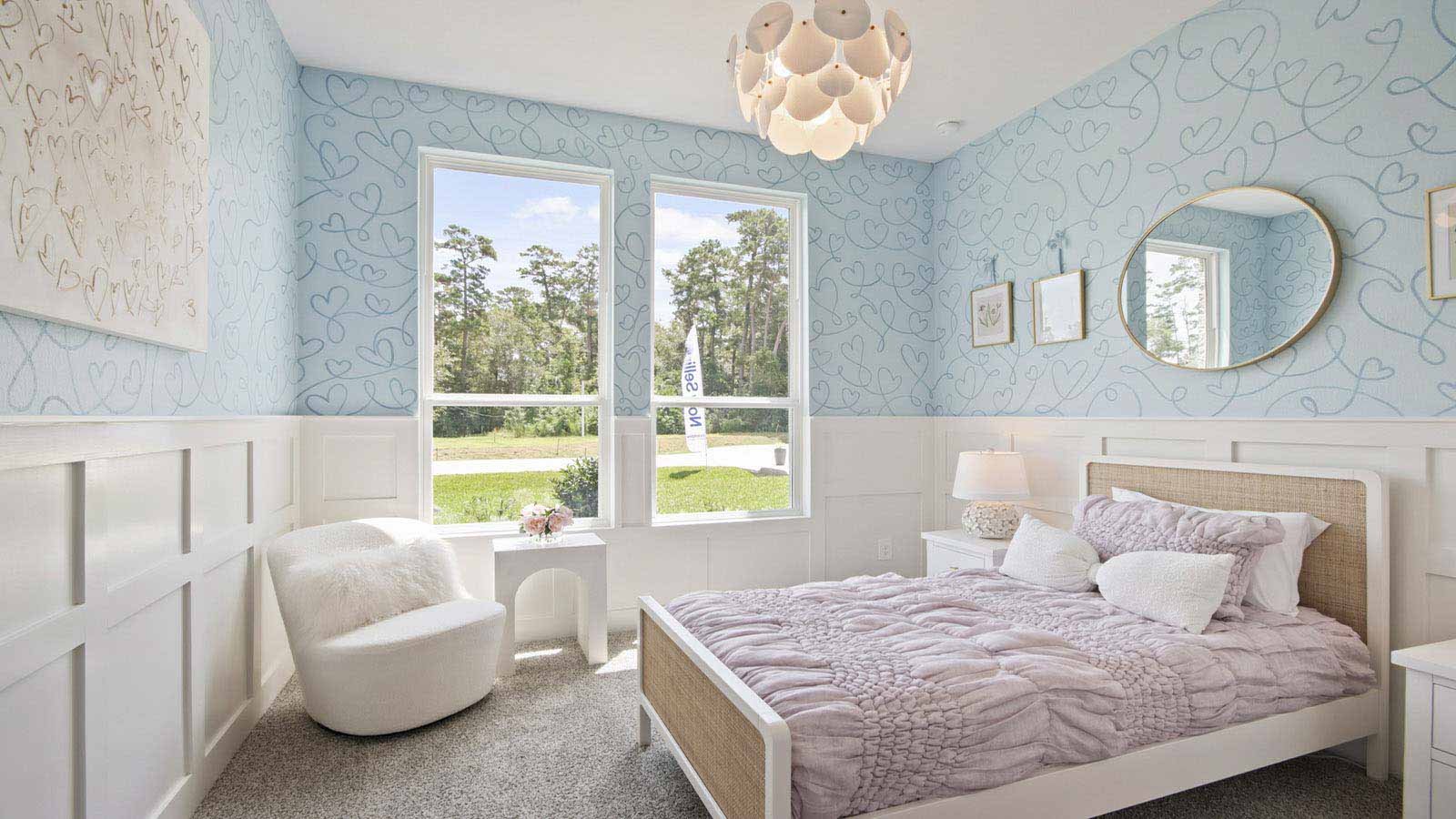 Secondary bedroom with shag carpet flooring and bright window