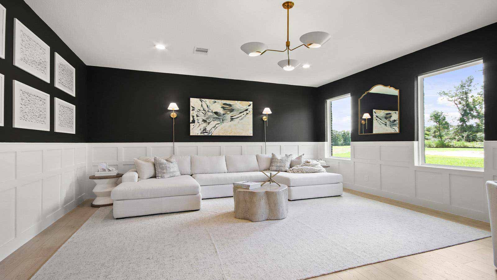 Spacious living area with vinyl flooring