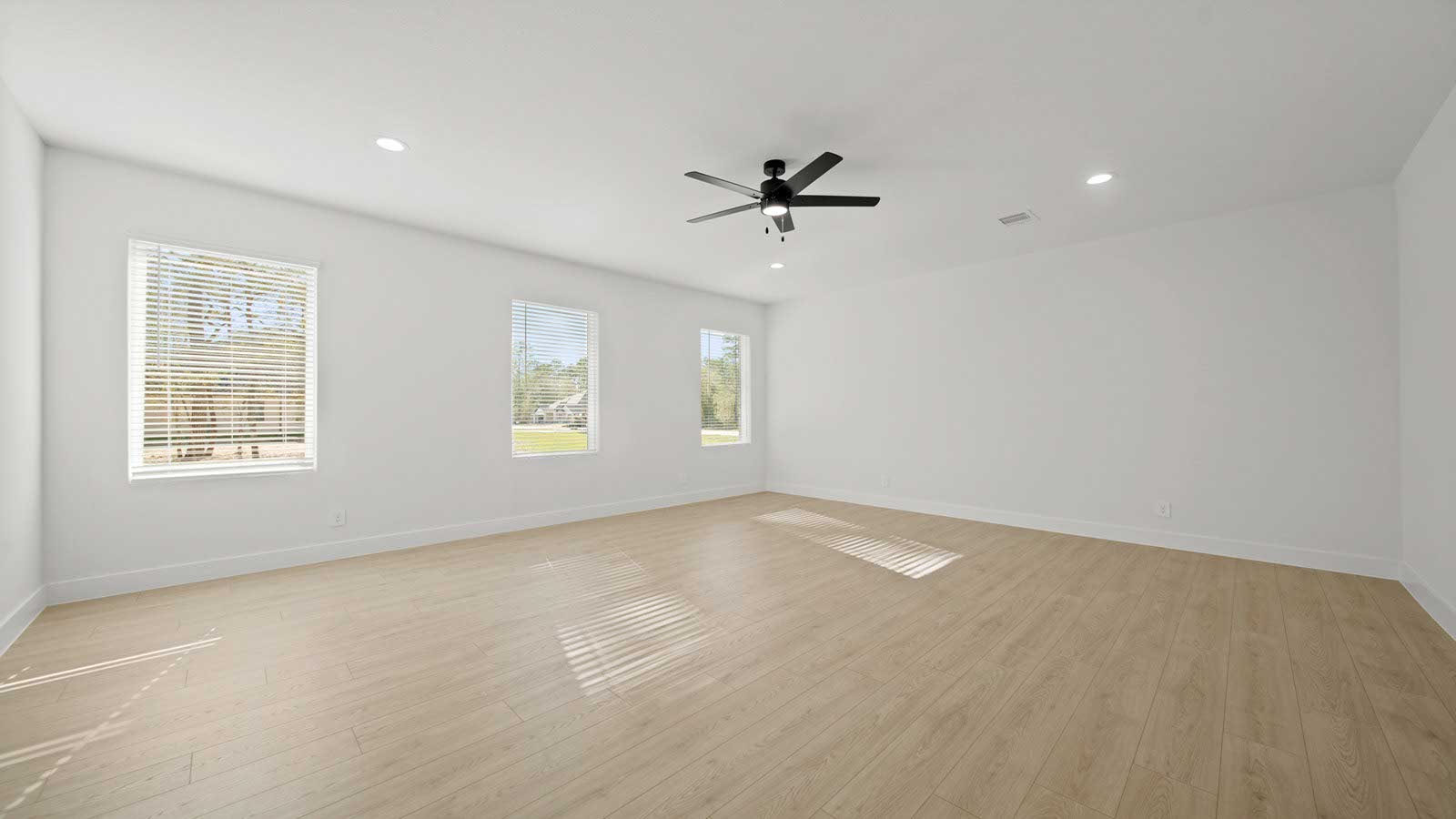 Primary bedroom with carpet flooring