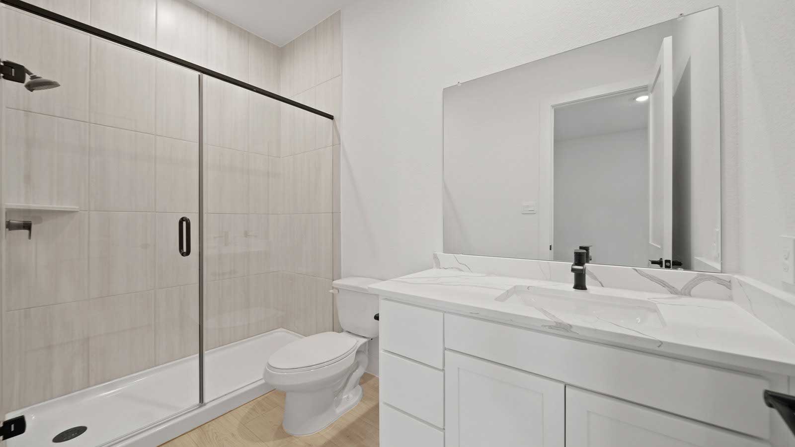 Secondary bathroom with tstand alone shower