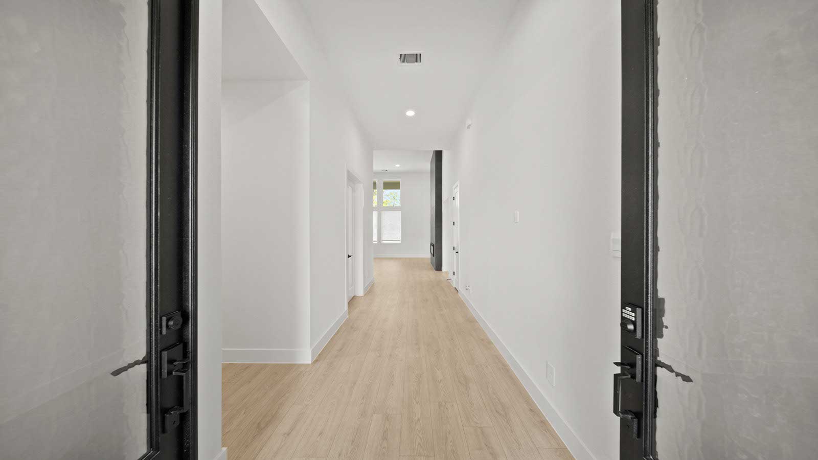 Entry hallway with vinyl flooring