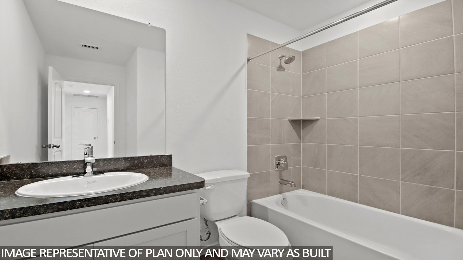 Secondary bathroom with a tub/shower combo.