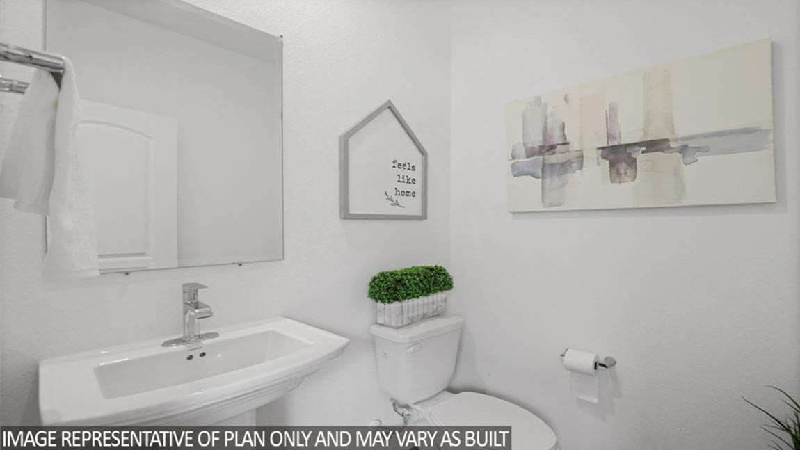 Powder room with pedestal sink.