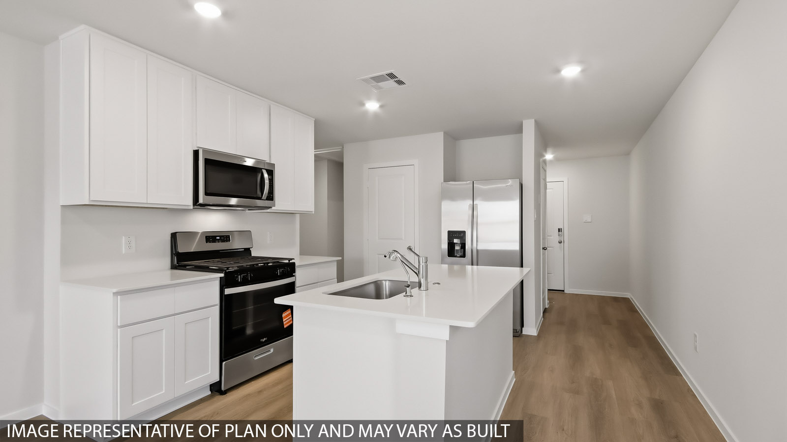 kitchen with quartz countertops and stainless steel appliances