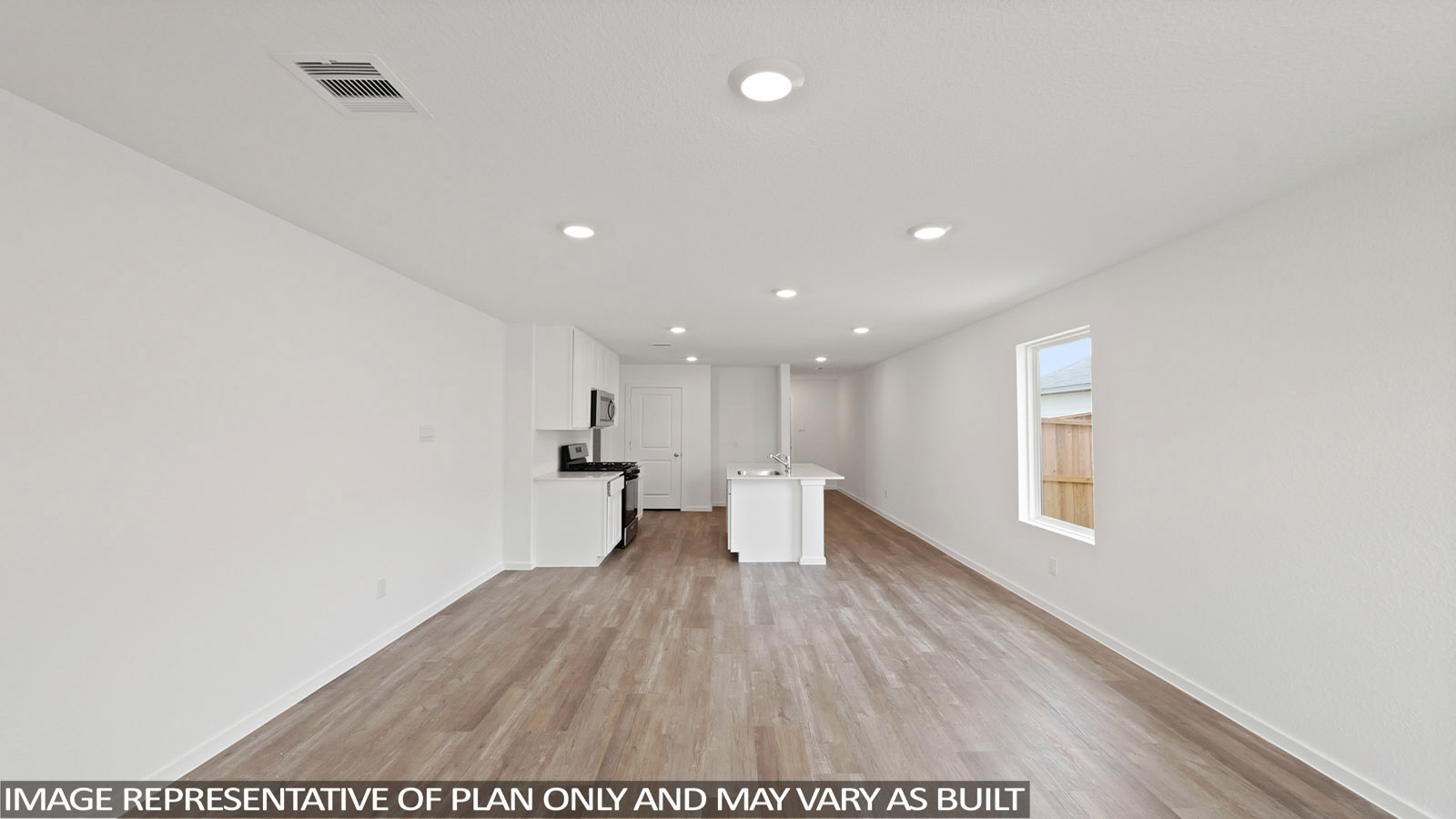 open concept living and dining area with vinyl flooring, stainless steel appliances, and quartz countertops in Hockley, Tx