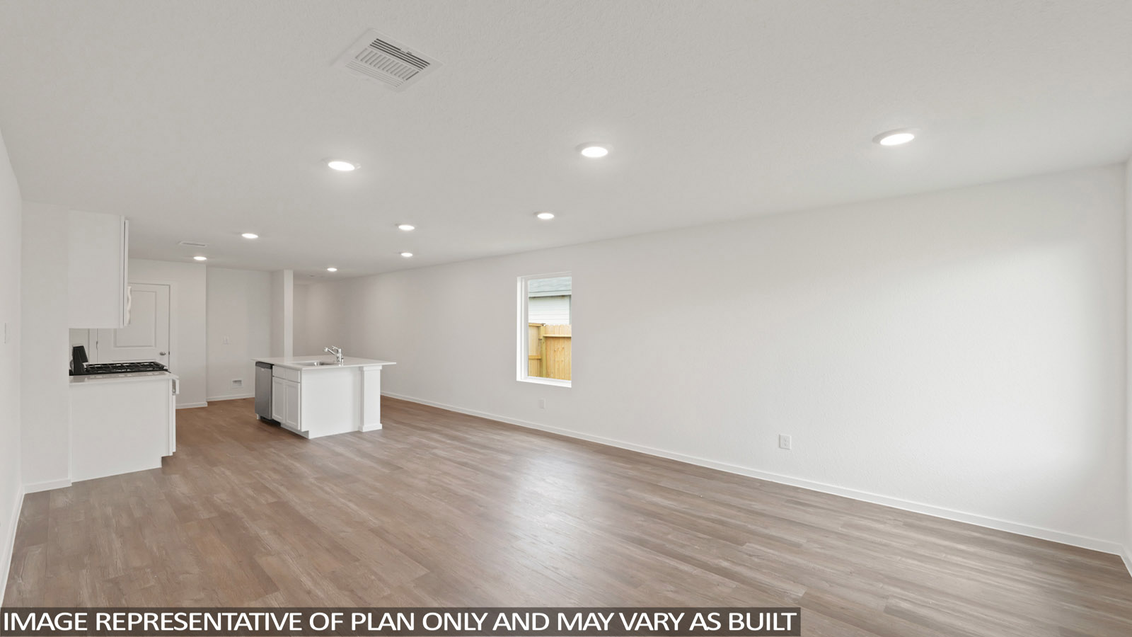 open concept living and dining area with vinyl flooring, stainless steel appliances, and quartz countertops in Hockley, Tx