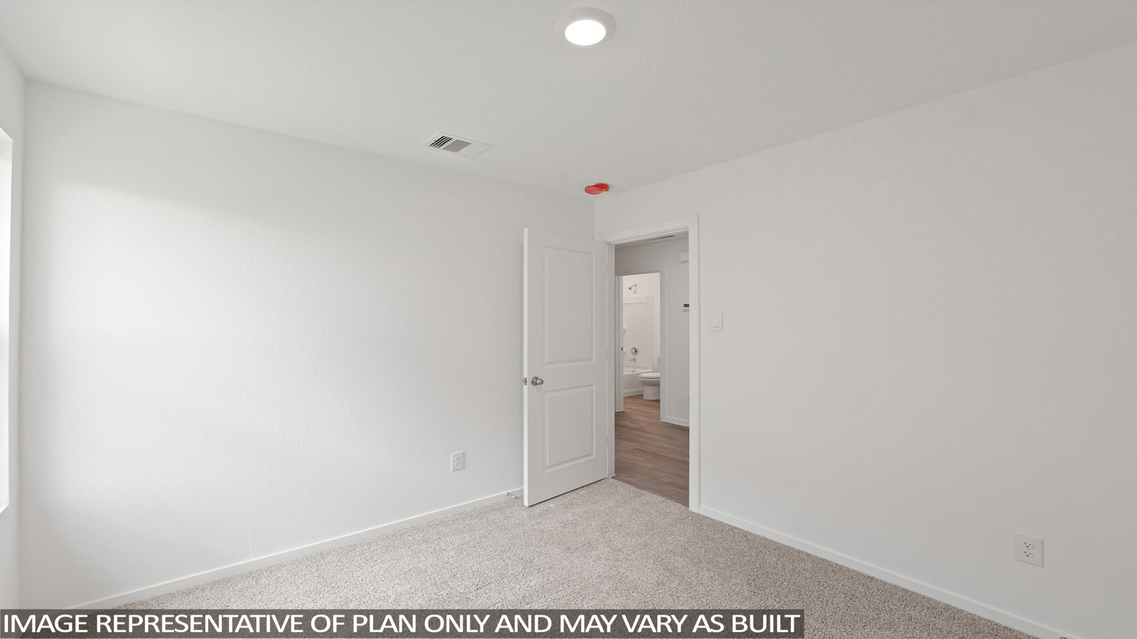 bedroom with carpet flooring and windows