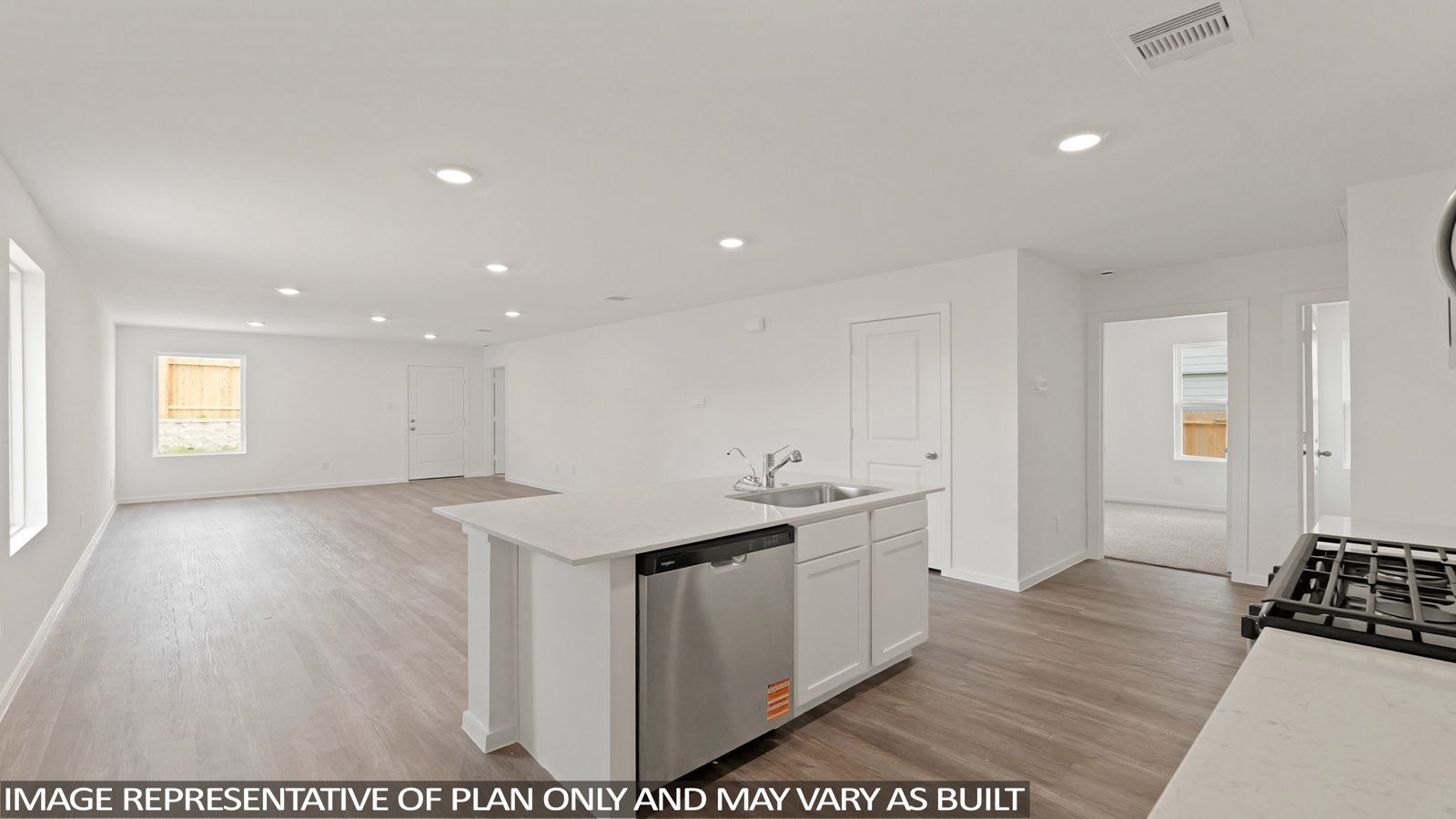 open concept living and dinng area with vinyl flooring, large windows, quartz countertops