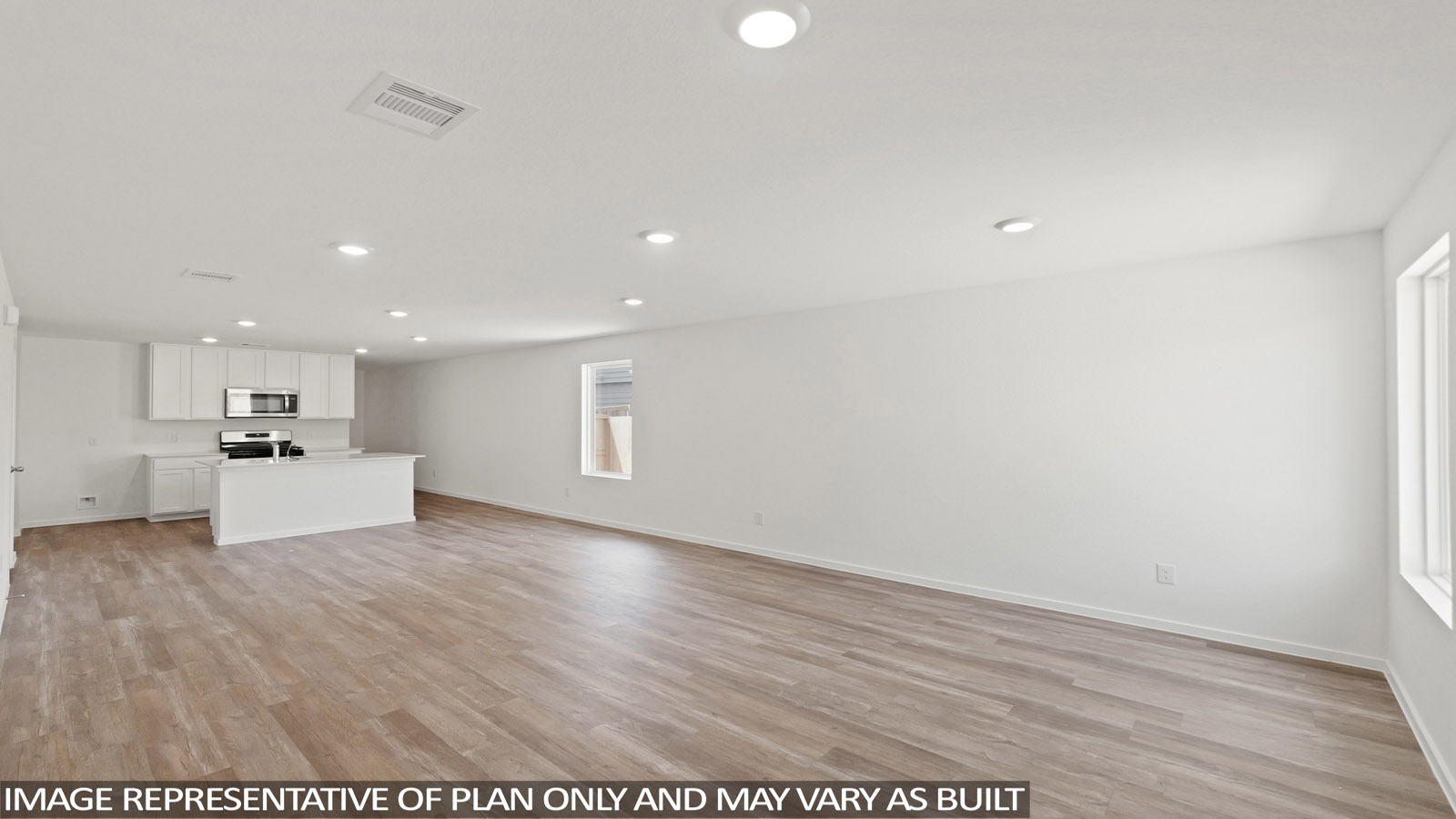 open concept living and dinng area with vinyl flooring, large windows, quartz countertops