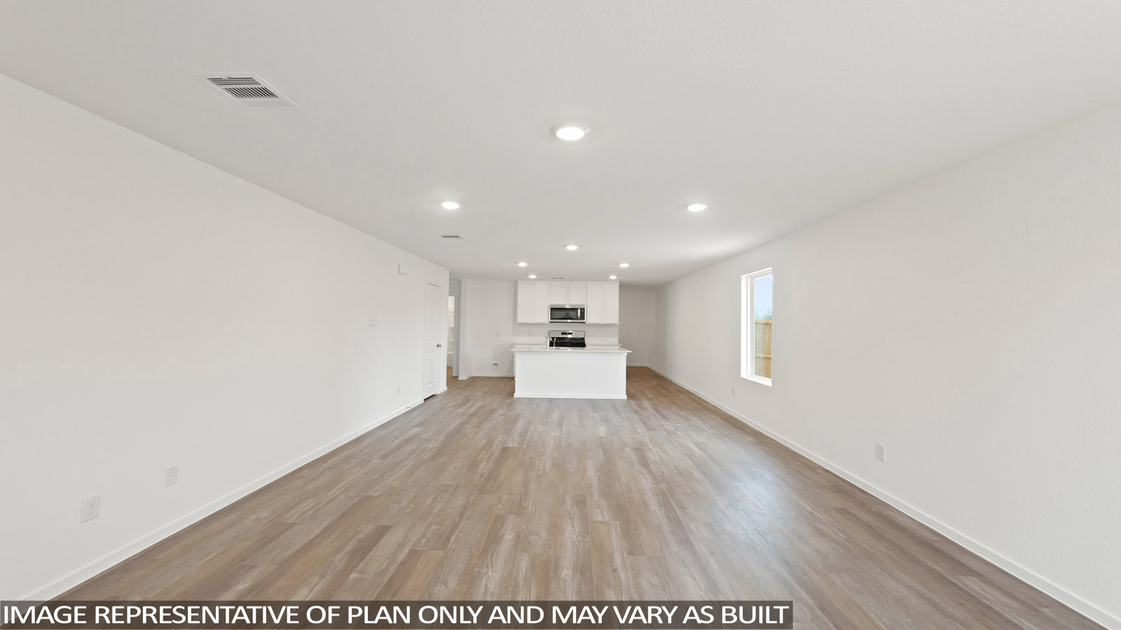 open concept living and dining area with vinyl flooring
