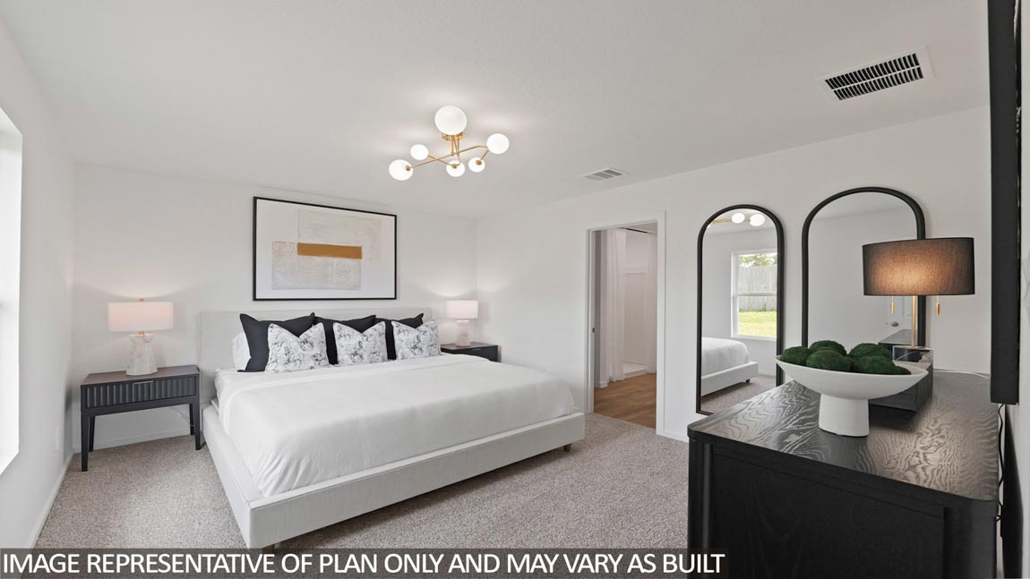 Large Primary bedroom with shag carpet flooring and bright window