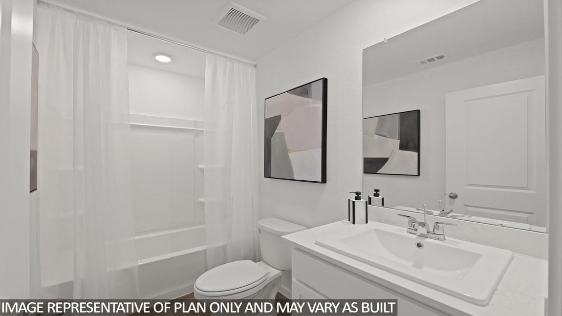 Secondary bathroom with tub/shower combo with quartz counter tops in Hockley TX