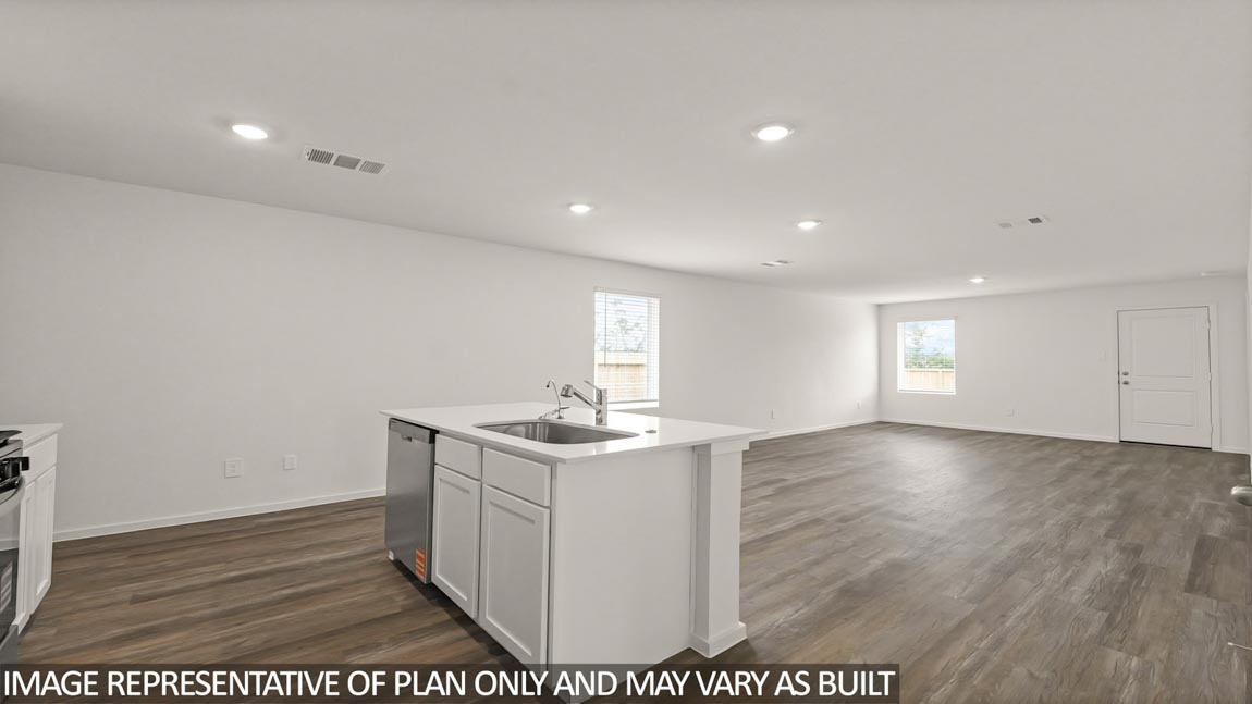 open concept living and dining area with vinyl flooring and large windows