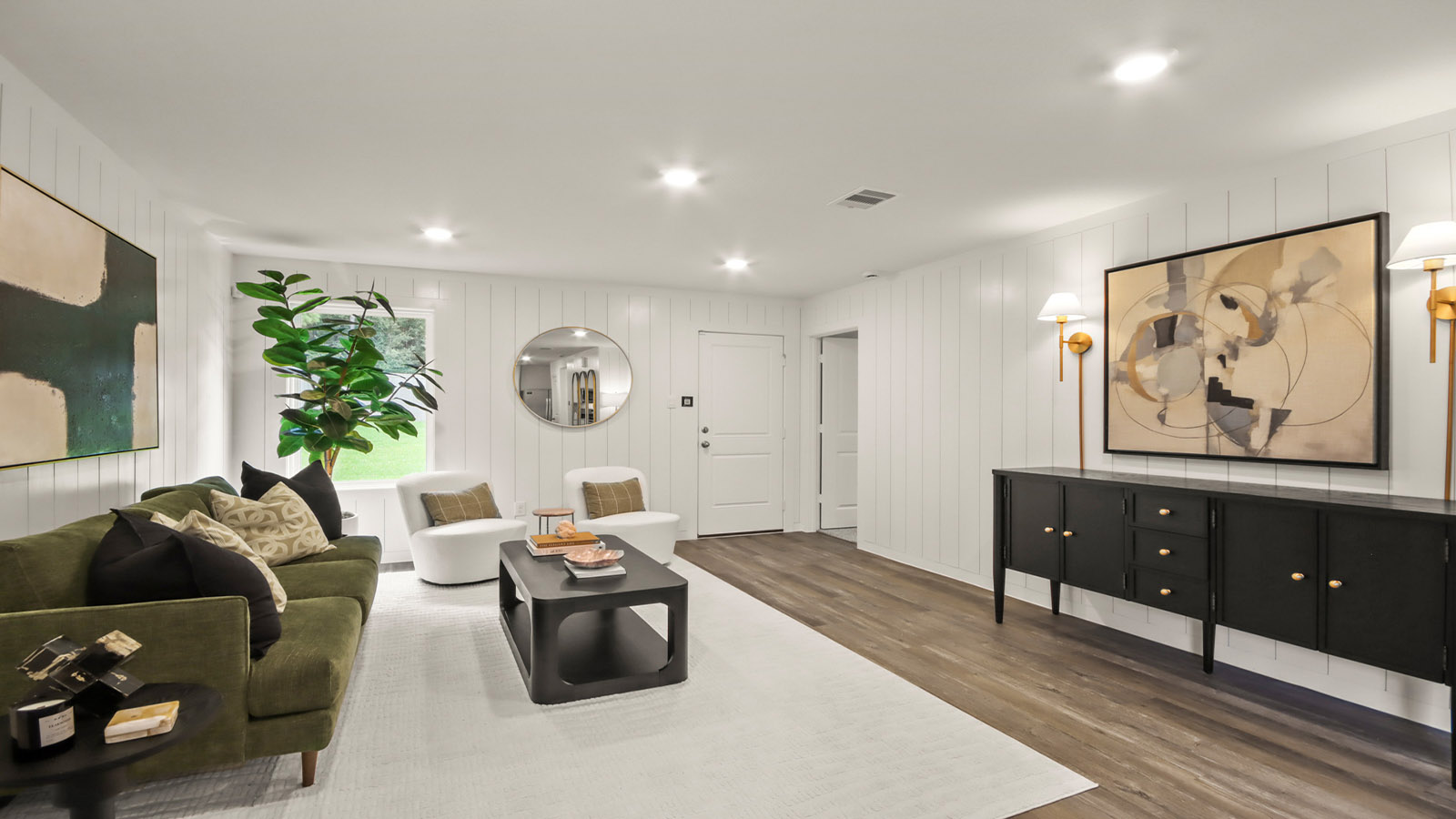 open concept living and dining with vinyl flooring