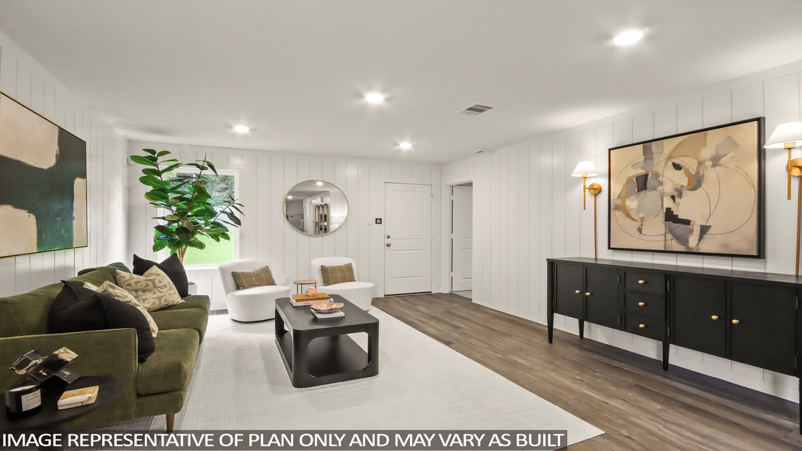 Spacious living area with vinyl flooring