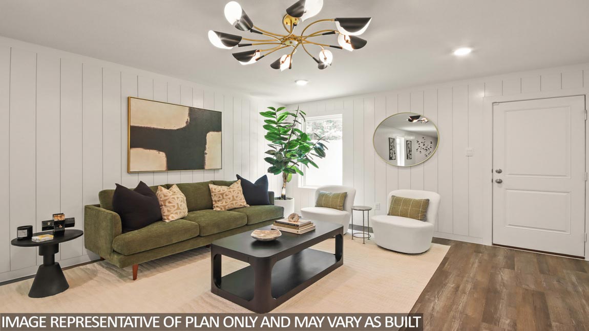 open concept living area with vinyl flooring, large windows, and quartz countertops