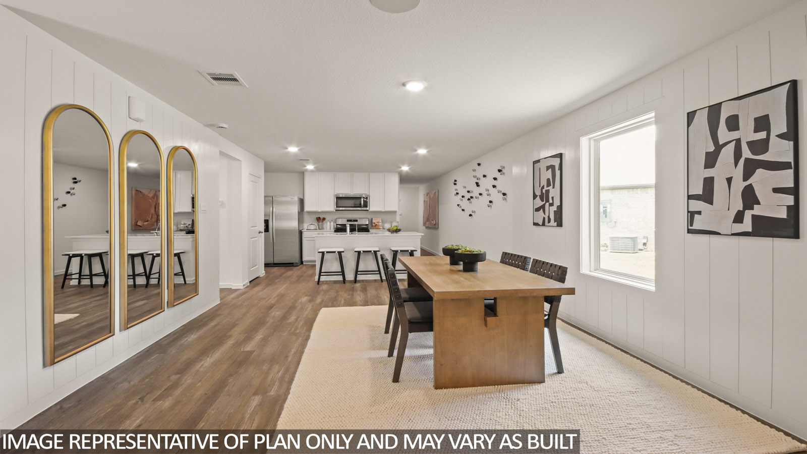 open concept living and dining area with inyl flooring