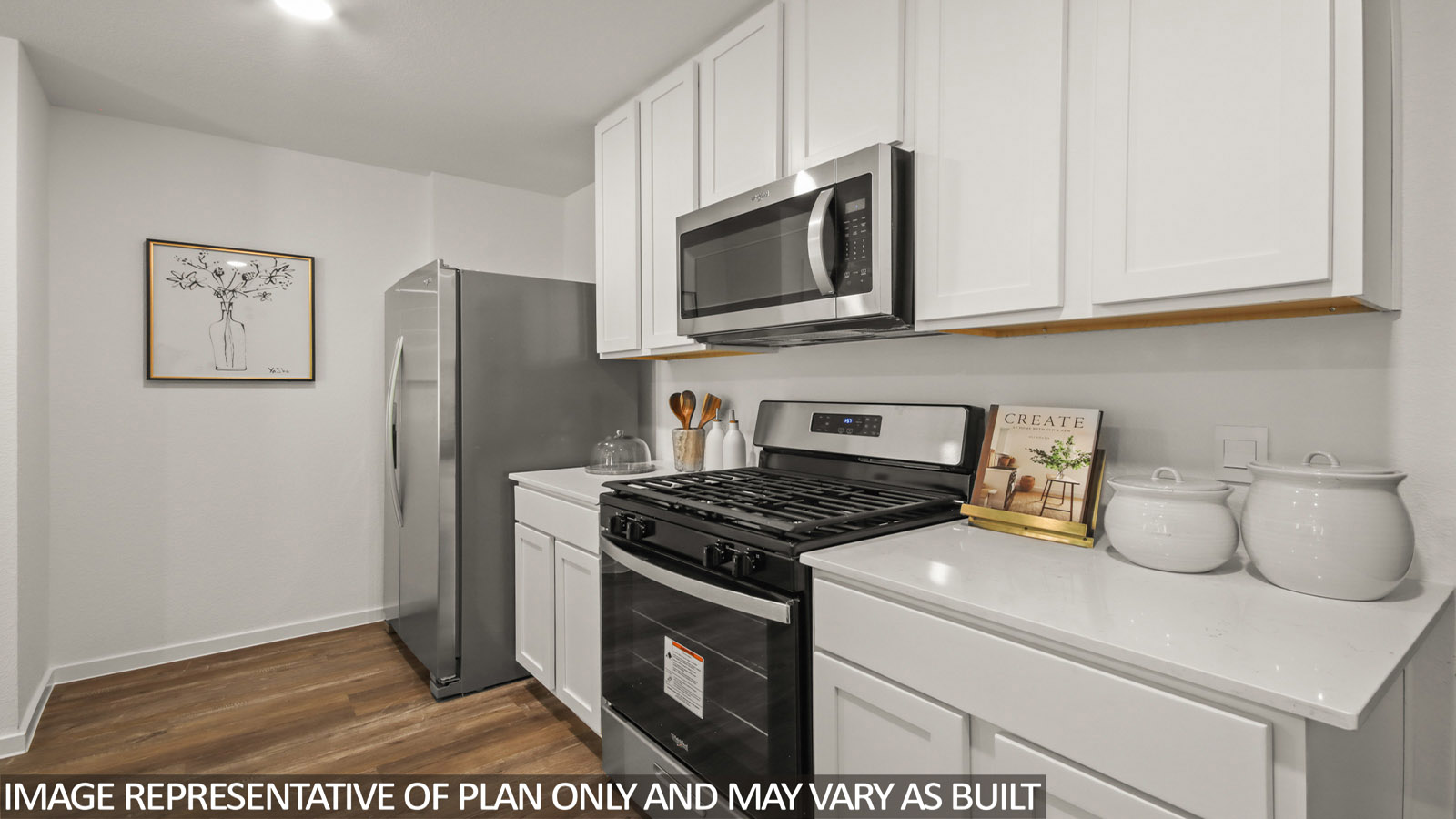 kitchen with quartz countertops, stainless steel appliances, and kitchen island