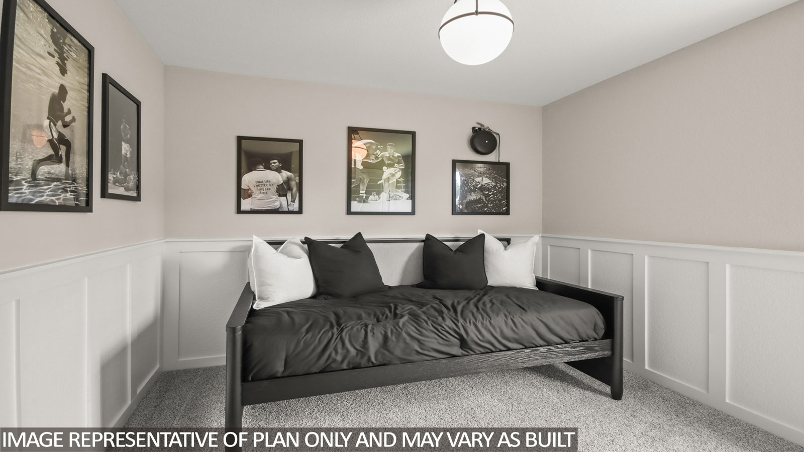 secondary bedoom with carpet flooring and window