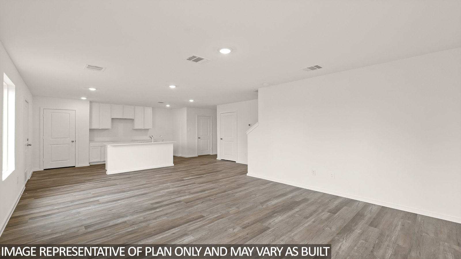 open concept living and dining area with vinyl flooring, large windows, quartz countertops in Hockley, TX