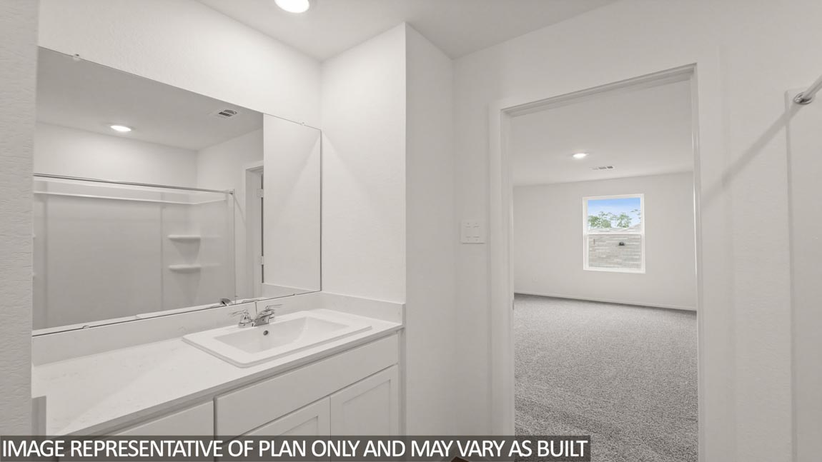 primary bathroom with tub and shower combo in Hockley, Texas