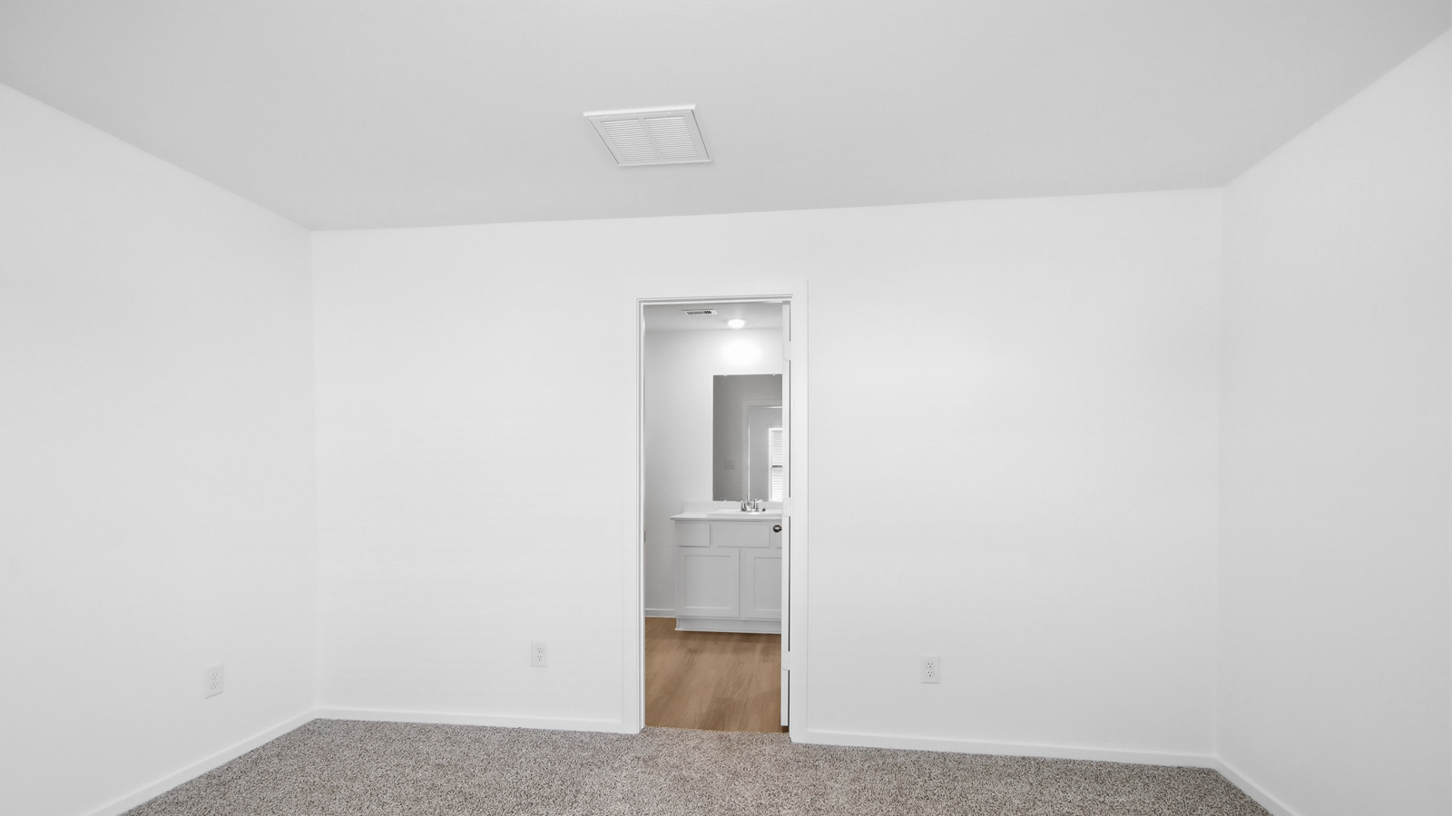 open concept living and dining area with vinyl  flooring, large windows, and quartz countertops