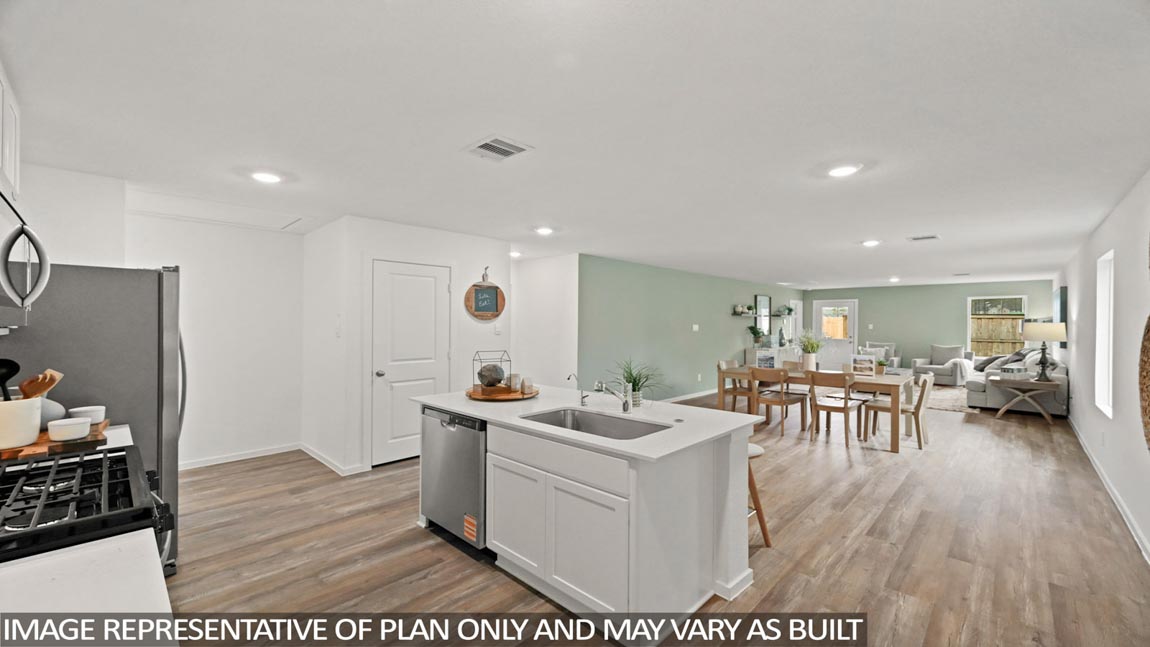 open concept livivng and diing area with vinyl flooring, quartz countertops, nd large windows