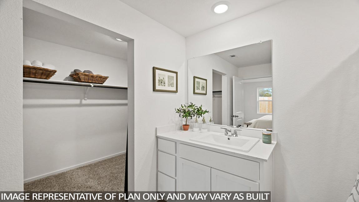 Primary bathroom with single sink with quartz counter tops in Hockley TX