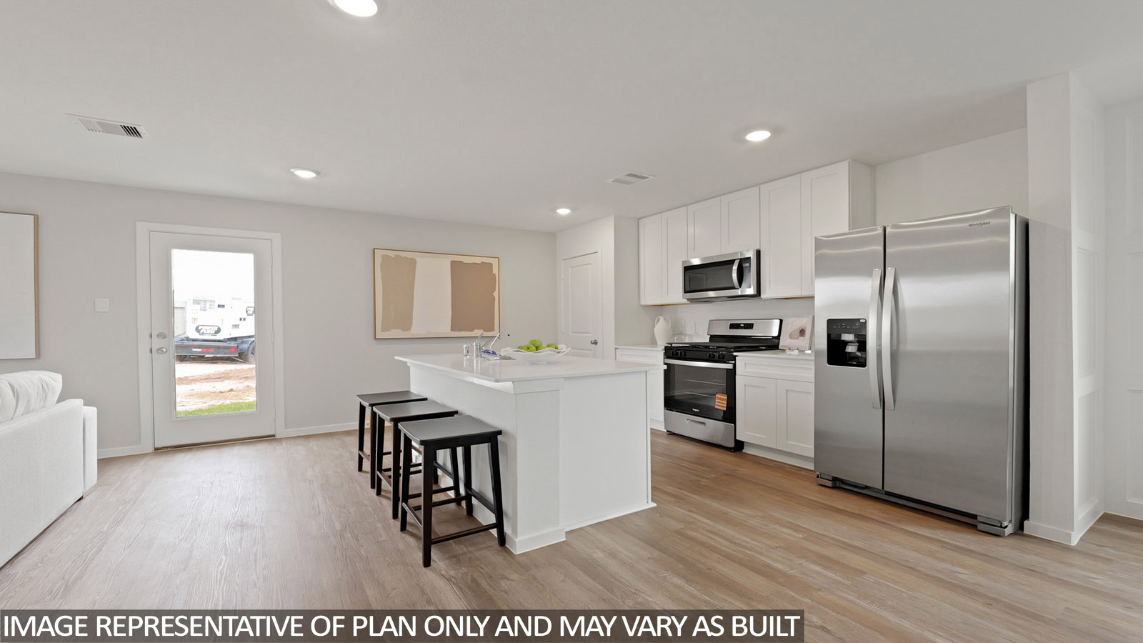 open concept living and dining area with vinyl flooring and quartz countertops