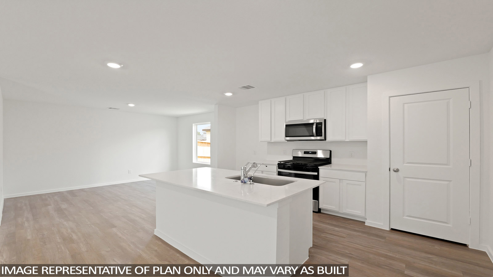 open concept living and dining area with vinyl flooring and quartz countertops