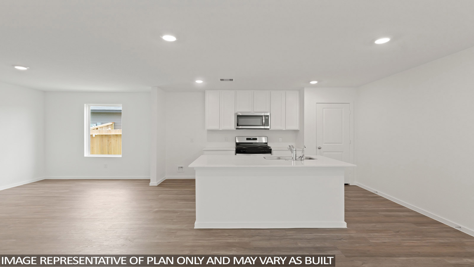 open concept living and dining area with vinyl flooring and quartz countertops