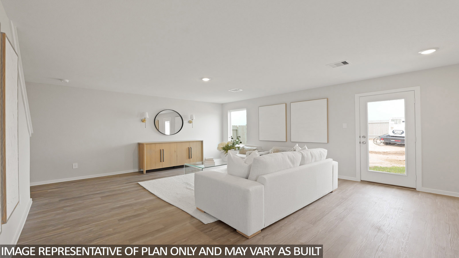 open concept living and dining area with vinyl flooring, large windows, and quartz countertops