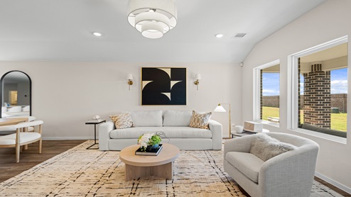 open concept living and fining room with vinyl flooring