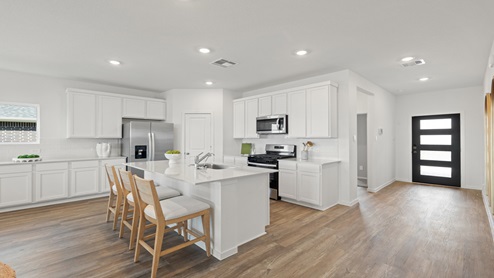 open concept living and fining room with vinyl flooring