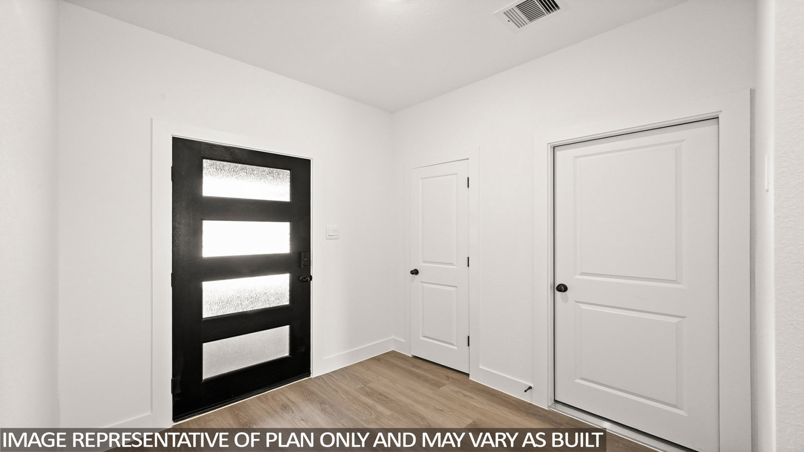 Entry hallway with vinyl flooring