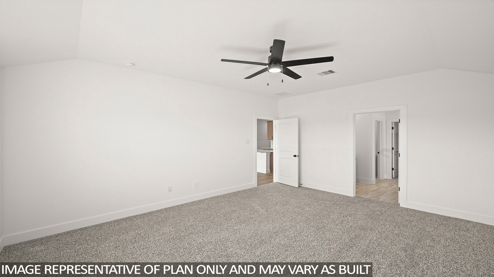 Primary bedroom with carpet flooring