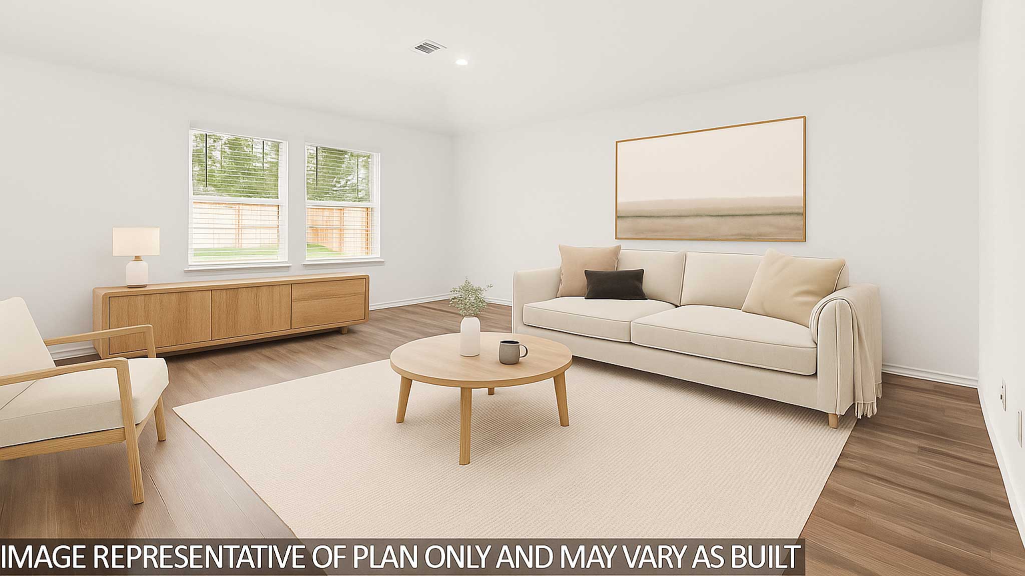 Living room looking to dining and kitchen areas in this new home features natural light, with fresh open concept flow