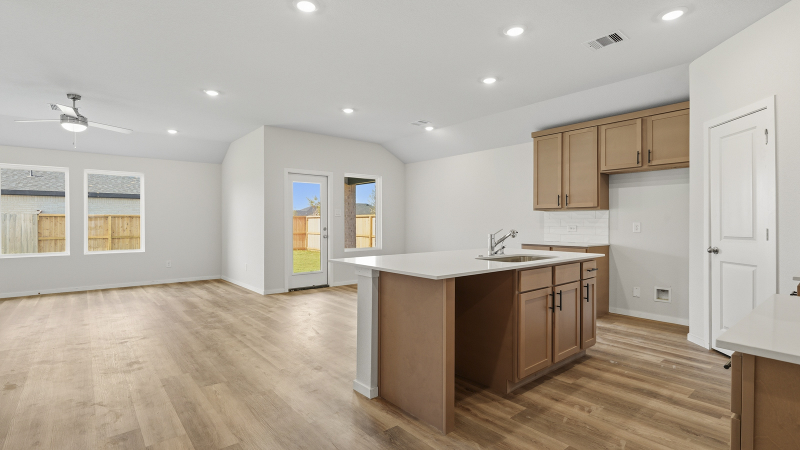 kitchen with quartz countertops and stainless steel appliances in Brookshire, TX