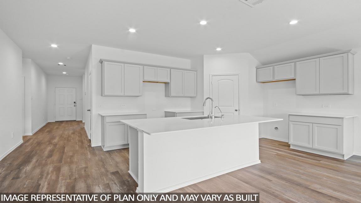 kitchen with quartz countertops and stainless steel appliances in Brookshire, TX
