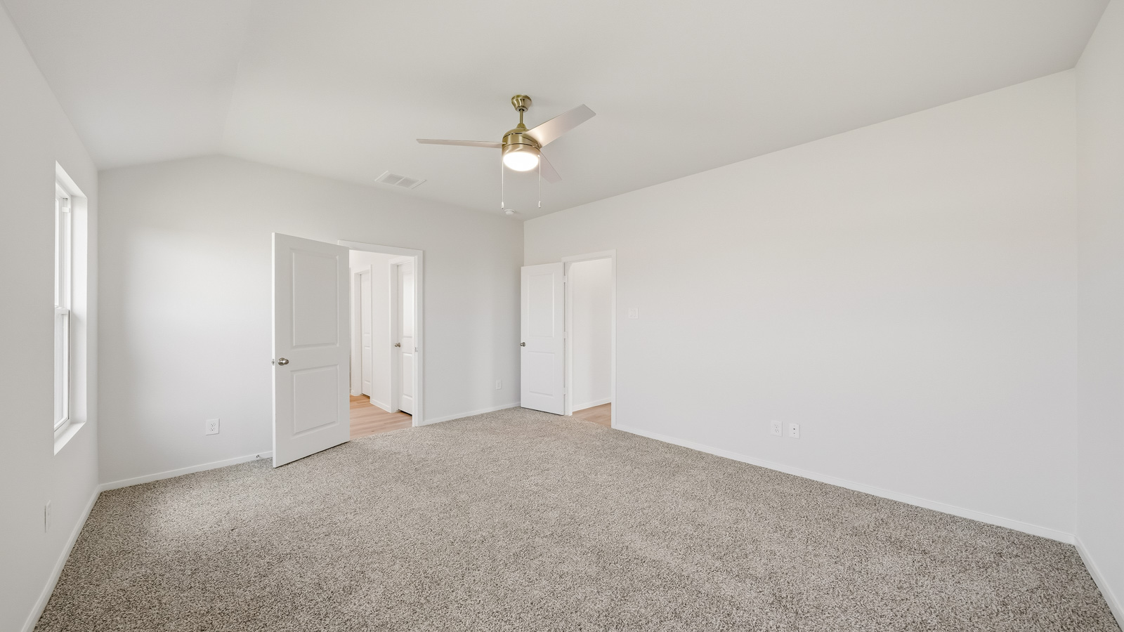 bedroom with carpet flooring and windows