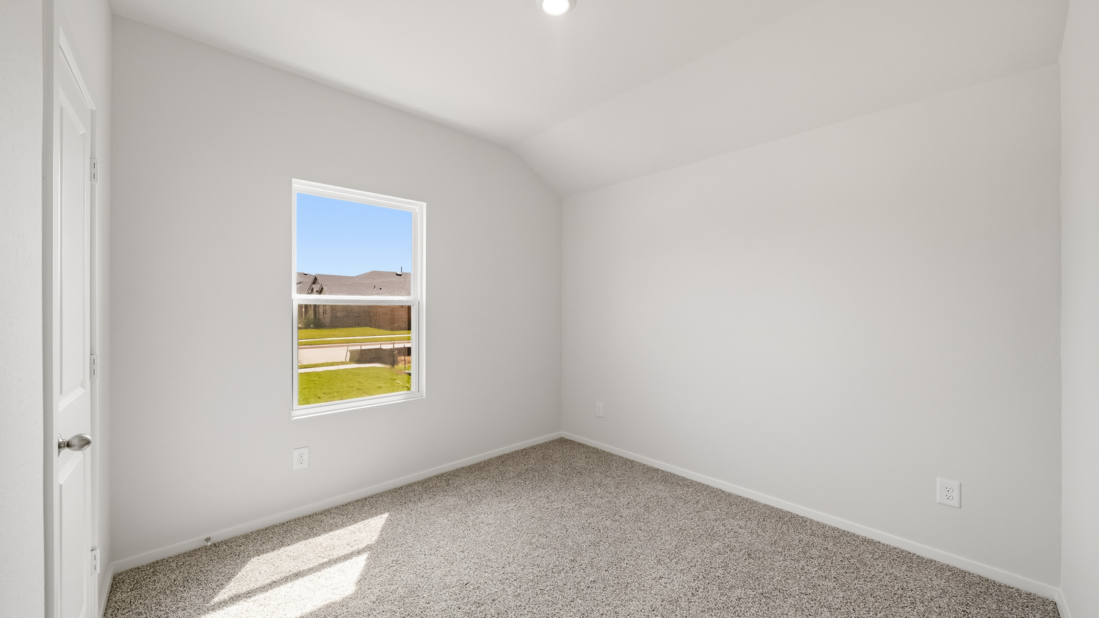 bedroom with carpet flooring and windows
