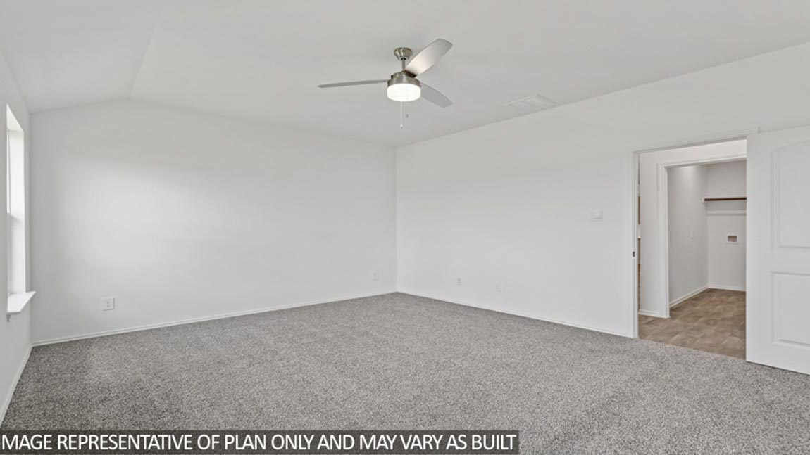 bedroom with carpet flooring and windows